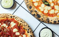 woodfired pizzas with garlic sauce