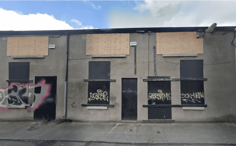 An ‘estate agents’ has popped up in D7 highlighting derelict and vacant Dublin buildings