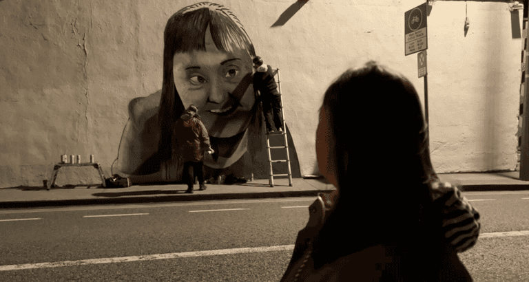 Street artist Emmalene Blake unveils meaningful mural for World Down Syndrome Day