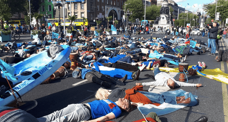 PICS: Extinction Rebellion Staged A ‘Die-In’ On O’Connell Bridge This Afternoon