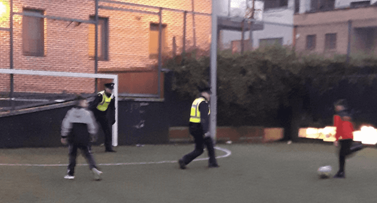 PICS: These Gardaí took a quick break to play a game of 3-a-side with locals