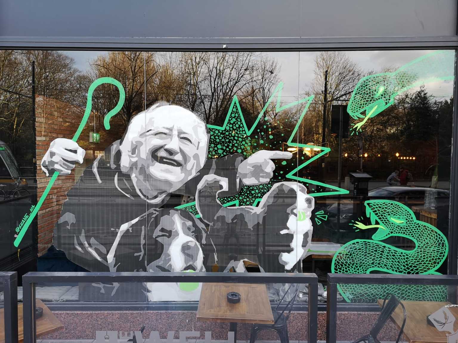 New St. Patrick’s Day mural shows President Higgins and his dogs chase out the snakes