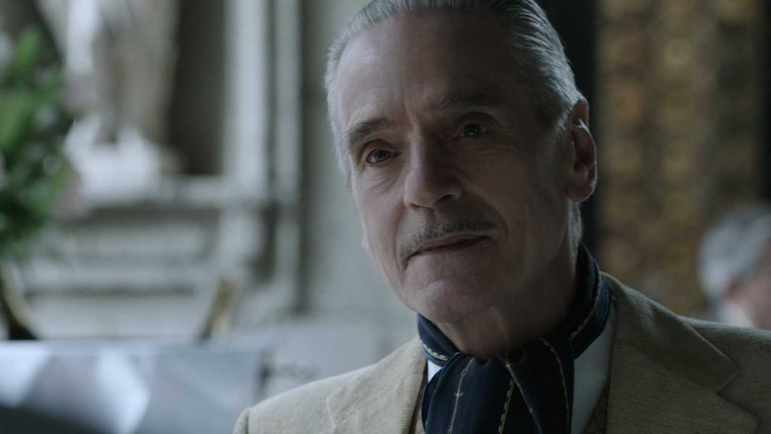WATCH: Jeremy Irons discusses House of Gucci, working with Lady Gaga & reuniting with Al Pacino