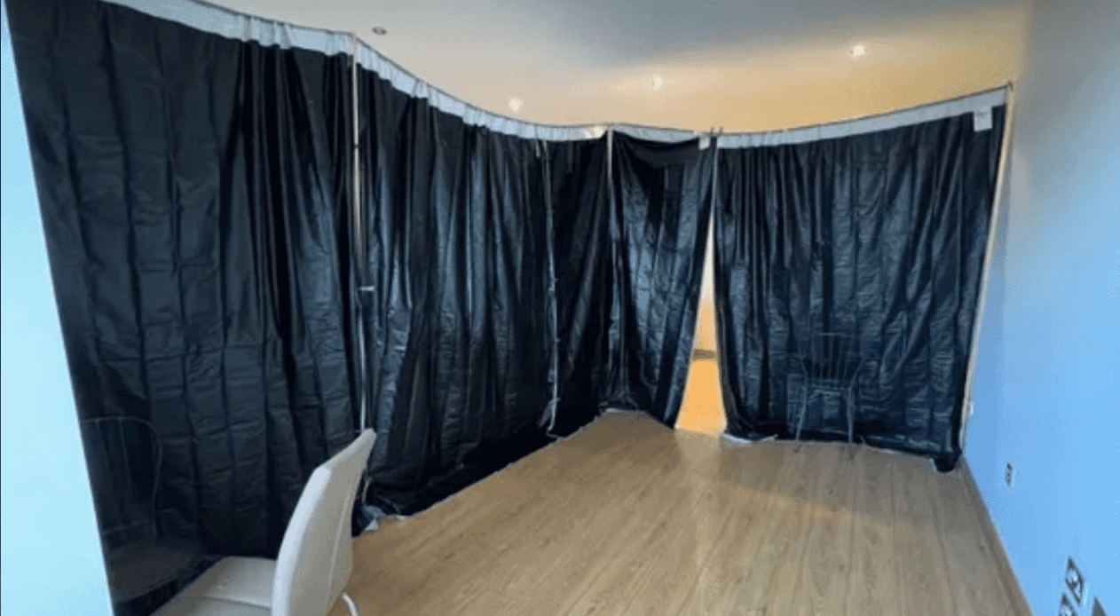 Southside property advertises ‘bedroom’ to rent with black plastic sheets instead of walls