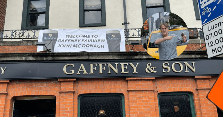 NYC cabby is welcomed with banner to settle 9-year pint debt