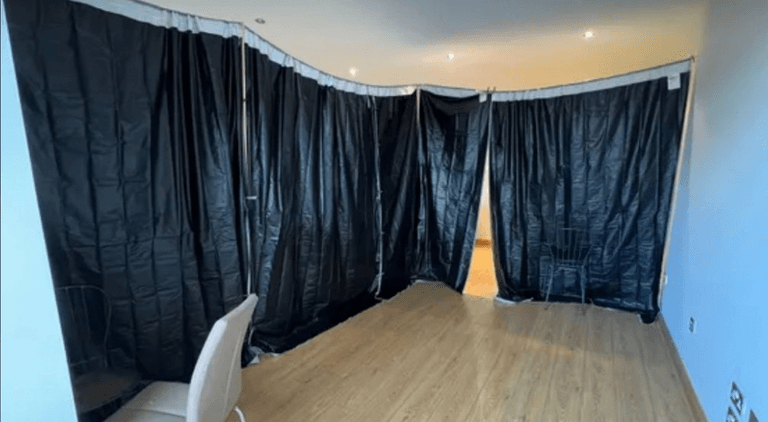 Southside property advertises ‘bedroom’ to rent with black plastic sheets instead of walls