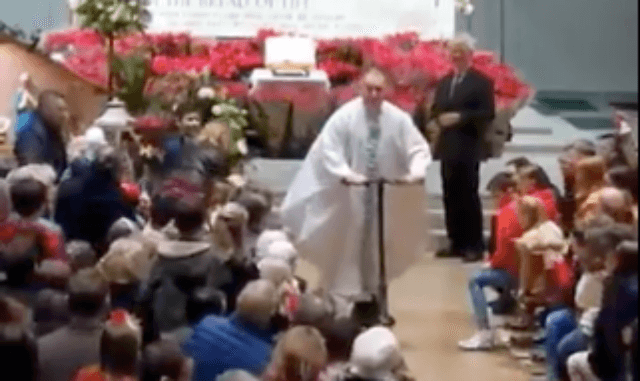 Hilarious Dublin priest leaves Christmas Eve mass on electric scooter Hilarious Dublin priest leaves Christmas Eve mass on electric scooter