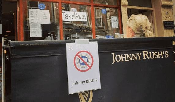 City centre bar displays sign banning Canada Goose clothing City centre bar displays sign banning Canada Goose clothing